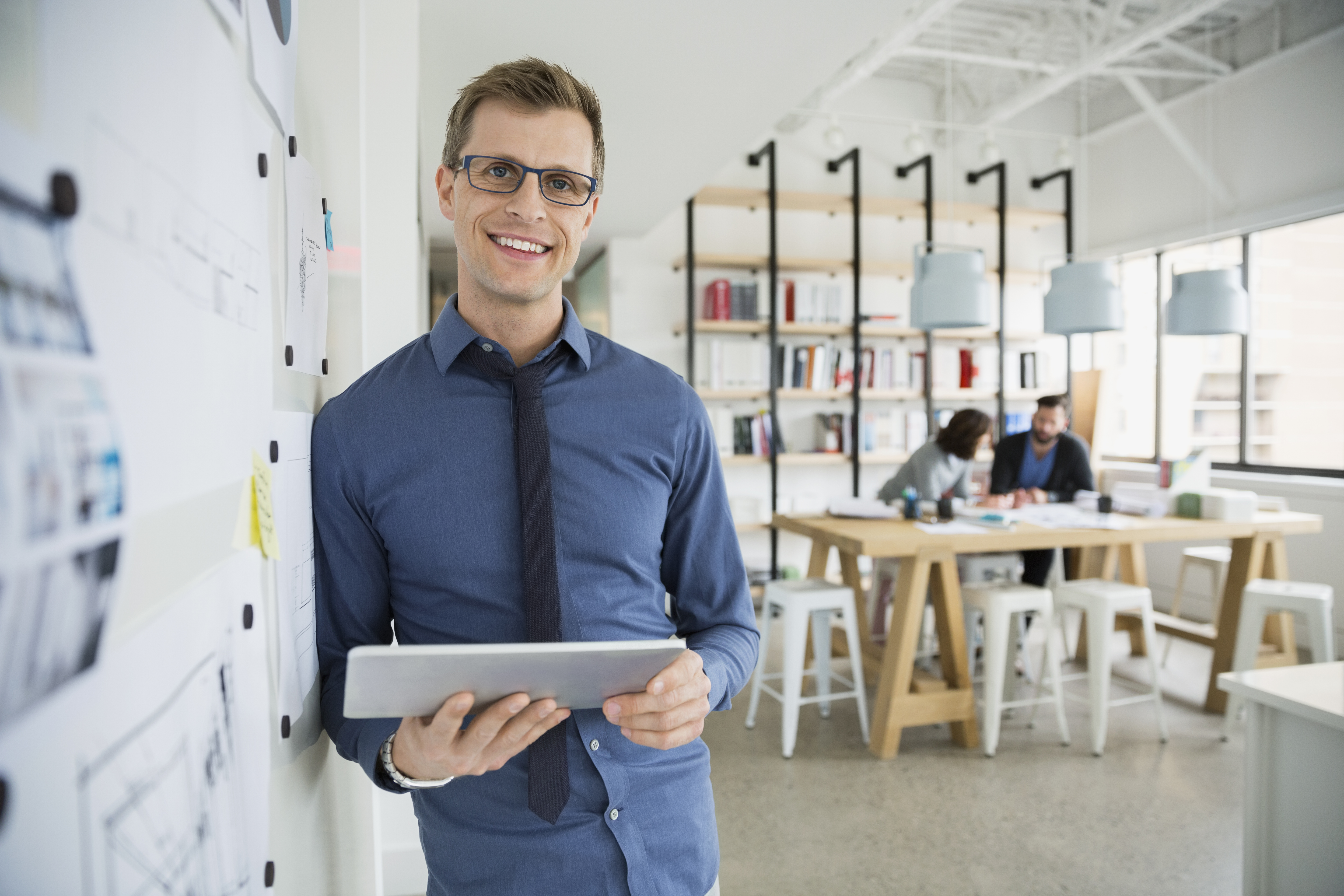 Professional Man Holding a Tablet